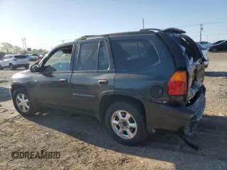 2004 GMC Envoy SLE with VIN 1GKDT13S042404250, listed as a Copart auction lot 52672455 with 230,610 mi miles and Salvage Title. Bid and sale history available at carsss.com. Image 2.