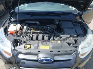 2014 Ford Focus SE with VIN 1FADP3F2XEL120830, listed as a IAAI auction lot 42082905 with 19,128 mi miles and . Bid and sale history available at DreamBid. Image 10.