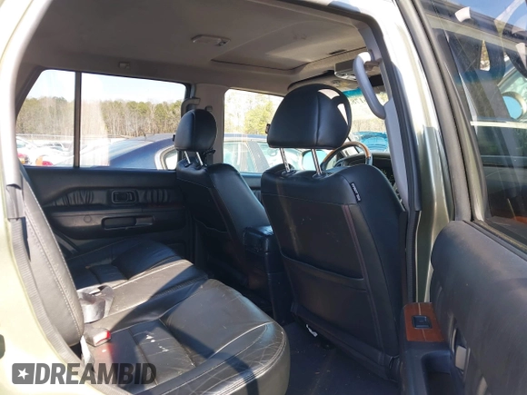 2003 Infiniti QX4 with VIN JNRDR09X13W251912, listed as a IAAI auction lot 41617833 with 162,231 mi miles and . Bid and sale history available at DreamBid. Image 8.