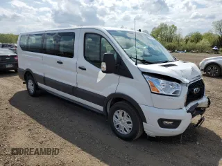2021 Ford Transit Passenger XL z VIN 1FBAX2Y88MKA30996, wystawiony jako Copart lot #52709324 z przebiegiem 86 753 mil mil oraz Szkoda całkowita • Salvage title. Historia ofert i sprzedaży dostępna na DreamBid. Obrazek 4.