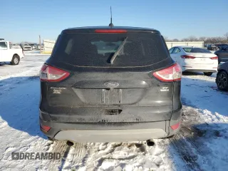 2014 Ford Escape SE z VIN 1FMCU9G95EUA94916, wystawiony jako Copart lot #41660525 z przebiegiem 146 941 mil mil oraz Szkoda całkowita • Salvage title. Historia ofert i sprzedaży dostępna na DreamBid. Obrazek 6.