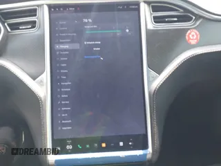 2015 Tesla Model S 85D with VIN 5YJSA1H21FFP79565, listed as a IAAI auction lot 42076401 with 162,139 mi miles. Bid and sale history available at carsss.com. Image 18.