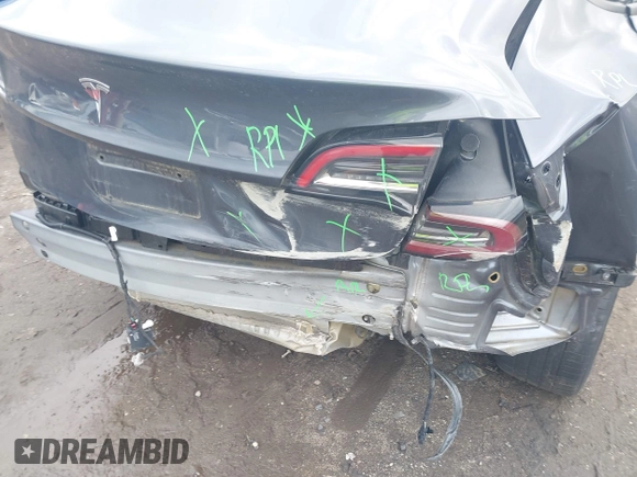 2023 Tesla Model 3 with VIN 5YJ3E1EAXPF628911, listed as a IAAI auction lot 42362410 with 25,387 mi miles and . Bid and sale history available at DreamBid. Image 20.