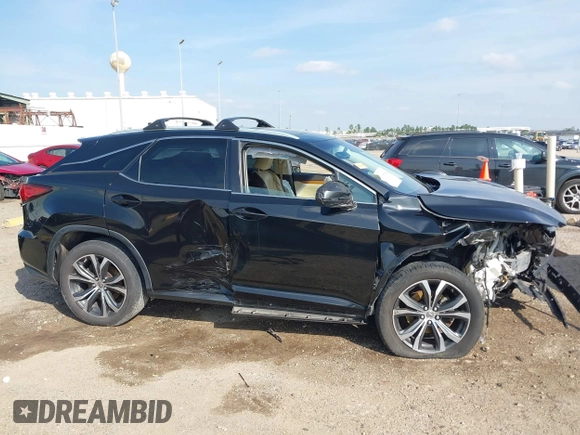 2017 Lexus RX 350 with VIN 2T2ZZMCA5HC042590, listed as a IAAI auction lot 41600994 with 126,660 mi miles and . Bid and sale history available at DreamBid. Image 12.