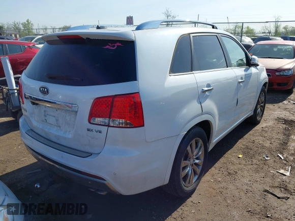 2013 Kia Sorento SX with VIN 5XYKW4A21DG360070, listed as a IAAI auction lot 42120968 with 196,932 mi miles. Bid and sale history available at carsss.com. Image 4.