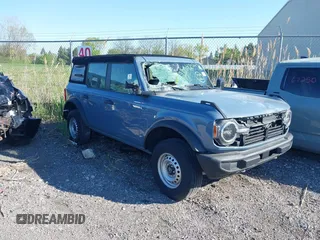 2023 Ford Bronco z VIN 1FMDE5BH5PLB17435, wystawiony jako IAAI lot #42039736 z przebiegiem 36 188 mil mil oraz . Historia ofert i sprzedaży dostępna na DreamBid. Obrazek 1.
