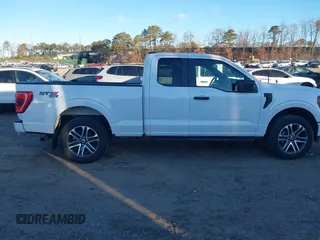 2023 Ford F-150 XL with VIN 1FTEX1EP5PKE55616, listed as a IAAI auction lot 41258148 with 23,303 mi miles and . Bid and sale history available at DreamBid. Image 12.