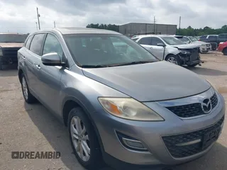 2012 Mazda CX-9 Grand Touring with VIN JM3TB3DAXC0345592, listed as a IAAI auction lot 42182735 with 168,725 mi miles. Bid and sale history available at carsss.com. Image 1.