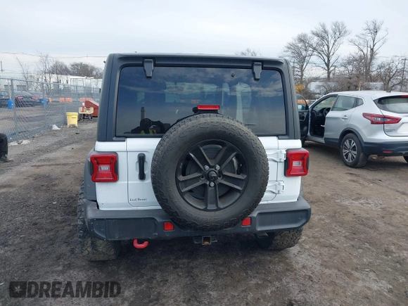 2021 Jeep Wrangler Unlimited Sport S with VIN 1C4HJXDN0MW612698, listed as a IAAI auction lot 41649323 with 22,539 mi miles and . Bid and sale history available at DreamBid. Image 16.