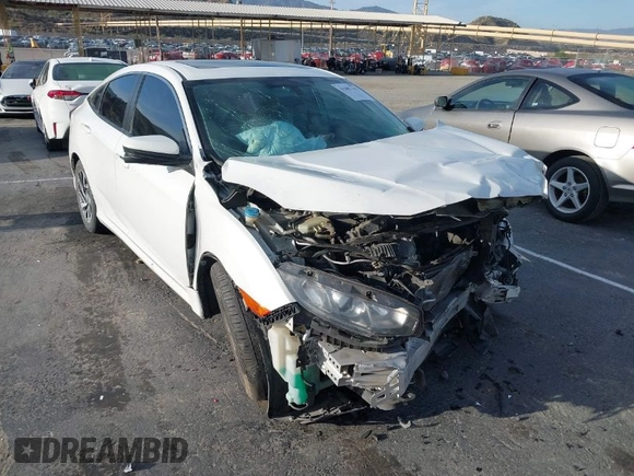 2017 Honda Civic EX z VIN 2HGFC2F76HH573639, wystawiony jako IAAI lot #41807311 z przebiegiem 140 431 mil mil oraz . Historia ofert i sprzedaży dostępna na DreamBid. Obrazek 1.