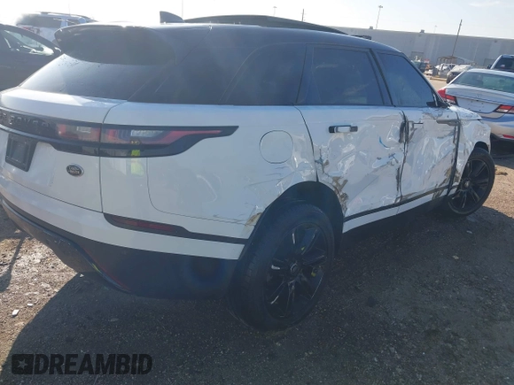 2020 Land Rover Range Rover Velar S z VIN SALYB2EX9LA289398, wystawiony jako IAAI lot #41658978 z przebiegiem 43 615 mil mil oraz . Historia ofert i sprzedaży dostępna na DreamBid. Obrazek 4.