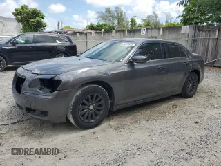 2013 Chrysler 300 with VIN 2C3CCAAG6DH723203, listed as a Copart auction lot 54534845 with 164,635 mi miles and Salvage title. Bid and sale history available at DreamBid. Image 1.