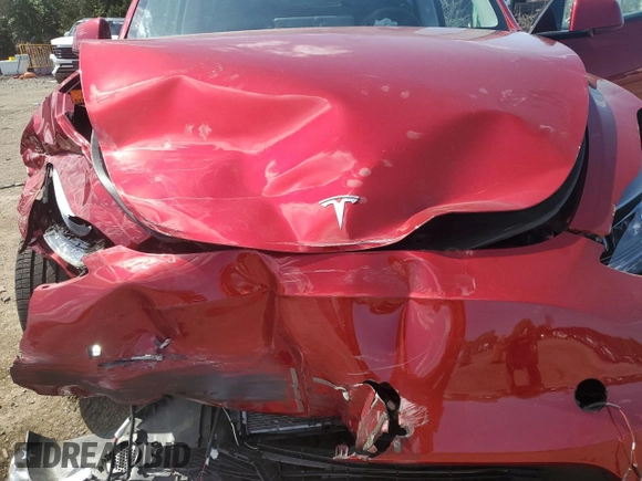 2024 Tesla Model Y Long Range z VIN 7SAYGDEE6RA261108, wystawiony jako Copart lot #55252805 z przebiegiem 16 932 mil mil oraz Szkoda całkowita • Salvage title. Historia ofert i sprzedaży dostępna na DreamBid. Obrazek 11.