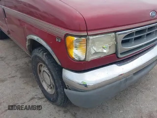1999 Ford Econoline Cargo with VIN 1FDRE14W0XHB06565, listed as a IAAI auction lot 41496511 with 165,268 mi miles. Bid and sale history available at carsss.com. Image 6.