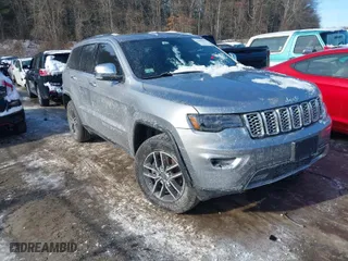 2019 Jeep Grand Cherokee Limited X with VIN 1C4RJFBG5KC693859, listed as a IAAI auction lot 41400893 with 106,966 mi miles. Bid and sale history available at carsss.com. Image 1.