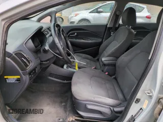 2013 Kia Rio EX with VIN KNADN4A38D6165846, listed as a Copart auction lot 61472955 with 180,536 mi miles and Salvage title. Bid and sale history available at DreamBid. Image 7.