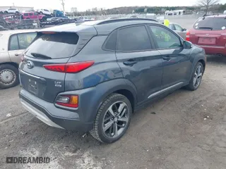 2020 Hyundai Kona Ultimate with VIN KM8K5CA56LU518063, listed as a IAAI auction lot 41911813 with 69,087 mi miles. Bid and sale history available at carsss.com. Image 4.