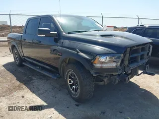 2017 Ram 1500 Rebel z VIN 1C6RR7YT6HS530288, wystawiony jako IAAI lot #41979534 z przebiegiem 126 682 mil mil oraz . Historia ofert i sprzedaży dostępna na DreamBid. Obrazek 1.