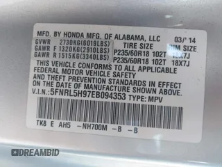 2014 Honda Odyssey Touring with VIN 5FNRL5H97EB094353, listed as a IAAI auction lot 41701712 with 141,228 mi miles and . Bid and sale history available at DreamBid. Image 9.