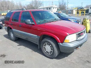 1998 GMC Jimmy SLT with VIN 1GKDT13W1W2521468, listed as a IAAI auction lot 41819921 with 161,931 mi miles. Bid and sale history available at carsss.com. Image 1.