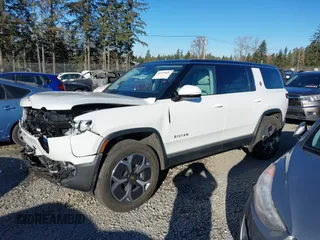 2024 Rivian R1S Adventure with VIN 7PDSGBBA9RN039684, listed as a IAAI auction lot 41558846 with 13,725 mi miles. Bid and sale history available at carsss.com. Image 15.