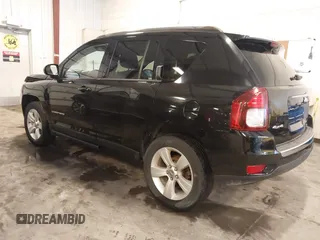 2015 Jeep Compass Latitude with VIN 1C4NJDEBXFD304409, listed as a IAAI auction lot 41629121 with 123,486 mi miles. Bid and sale history available at carsss.com. Image 3.