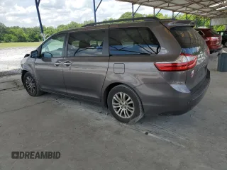 2015 Toyota Sienna XLE с VIN 5TDYK3DC0FS630013, выставлен на аукционе Copart как лот 60044955 с пробегом 124 063 миль миль и Списание • Salvage title. История ставок и продаж доступна на DreamBid. Изображение 2.