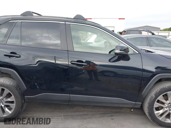 2022 Toyota RAV4 XLE Premium with VIN JTMC1RFV0ND085813, listed as a IAAI auction lot 42152401 with 86,707 mi miles and . Bid and sale history available at DreamBid. Image 13.