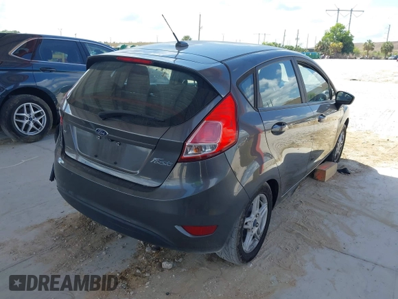 2019 Ford Fiesta SE with VIN 3FADP4EJ9KM156565, listed as a IAAI auction lot 42164212 with 133,759 mi miles and . Bid and sale history available at DreamBid. Image 4.
