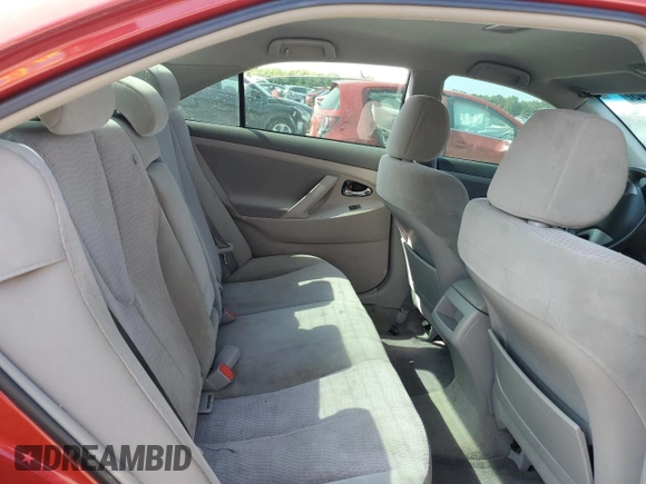 2011 Toyota Camry LE z VIN 4T4BF3EKXBR097272, wystawiony jako Copart lot #59220845 z przebiegiem Nie podano mil oraz Szkoda całkowita • Salvage title. Historia ofert i sprzedaży dostępna na DreamBid. Obrazek 10.
