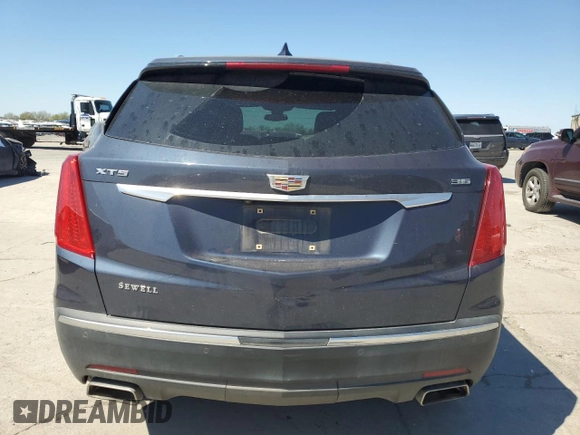 2019 Cadillac XT5 Luxury FWD with VIN 1GYKNCRS1KZ131818, listed as a Copart auction lot 49354595 with 131,995 mi miles and Salvage Title. Bid and sale history available at DreamBid. Image 6.
