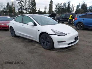 2021 Tesla Model 3 Long Range with VIN 5YJ3E1EB3MF856009, listed as a IAAI auction lot 41809767 with 42,072 mi miles. Bid and sale history available at carsss.com. Image 1.