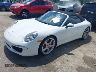 2014 Porsche 911 Carrera S z VIN WP0CB2A97ES154099, wystawiony jako IAAI lot #42264557 z przebiegiem 89 991 mil mil oraz . Historia ofert i sprzedaży dostępna na DreamBid. Obrazek 2.