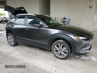 2023 Mazda CX-30 S Carbon Edition with VIN 3MVDMBCM9PM506691, listed as a Copart auction lot 55864895 with 21,441 mi miles and Salvage title. Bid and sale history available at DreamBid. Image 4.
