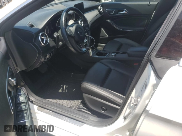 2019 Mercedes-Benz CLA 250 with VIN WDDSJ4EB6KN749419, listed as a Copart auction lot 64517735 with 73,323 mi miles and Salvage title. Bid and sale history available at DreamBid. Image 7.