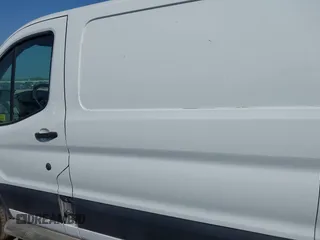 2018 Ford Transit with VIN 1FTYR1YM7JKA63317, listed as a IAAI auction lot 42216955 with 220,502 mi miles and . Bid and sale history available at carsss.com. Image 14.
