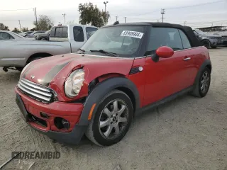 2010 MINI Convertible with VIN WMWMR3C56ATU97164, listed as a Copart auction lot 83908904 with 153,936 mi miles and Salvage Title. Bid and sale history available at DreamBid. Image 1.
