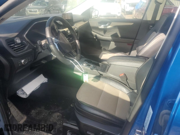2021 Ford Escape Titanium Hybrid z VIN 1FMCU9DZ9MUA18764, wystawiony jako Copart lot #78848764 z przebiegiem 89 499 mil mil oraz Nie do naprawy • Non repairable. Historia ofert i sprzedaży dostępna na DreamBid. Obrazek 7.