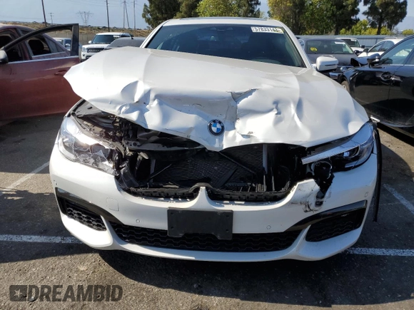 2018 BMW 7 Series 740i with VIN WBA7E2C5XJB214886, listed as a Copart auction lot 57833143 with 39,975 mi miles. Bid and sale history available at carsss.com. Image 5.