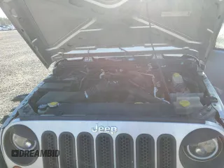2008 Jeep Wrangler Unlimited X with VIN 1J4GB39138L517920, listed as a Copart auction lot 76541144 with 213,002 mi miles and Salvage Title. Bid and sale history available at DreamBid. Image 12.