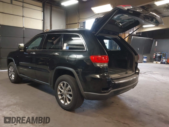 2015 Jeep Grand Cherokee Limited with VIN 1C4RJFBG8FC762873, listed as a IAAI auction lot 42098428 with 244,676 mi miles. Bid and sale history available at carsss.com. Image 3.