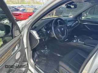 2015 BMW X5 xDrive35i with VIN 5UXKR0C57F0P14432, listed as a IAAI auction lot 42076389 with 119,109 mi miles. Bid and sale history available at carsss.com. Image 5.
