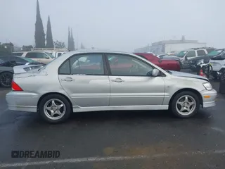 2002 Mitsubishi Lancer OZ-Rally with VIN JA3AJ86E92U038601, listed as a IAAI auction lot 41025991 with 162,450 mi miles. Bid and sale history available at carsss.com. Image 13.