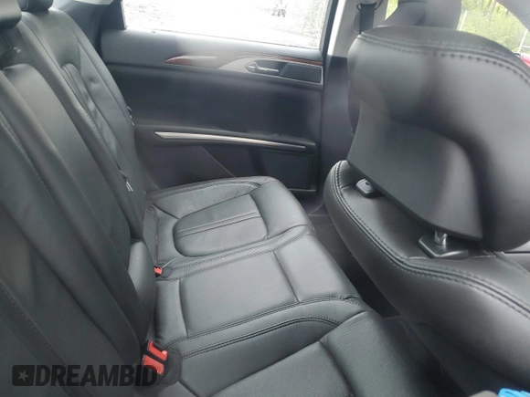 2014 Lincoln MKZ with VIN 3LN6L2JK7ER834055, listed as a Copart auction lot 58043045 with 56,010 mi miles and Salvage title. Bid and sale history available at DreamBid. Image 10.