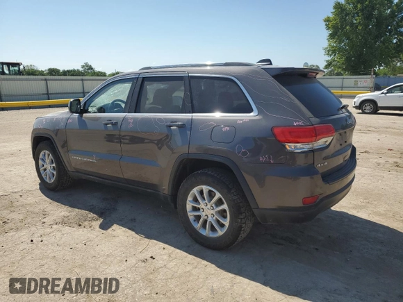 2016 Jeep Grand Cherokee Laredo with VIN 1C4RJFAG2GC328841, listed as a Copart auction lot 63553435 with 100,472 mi miles and Salvage title. Bid and sale history available at DreamBid. Image 2.