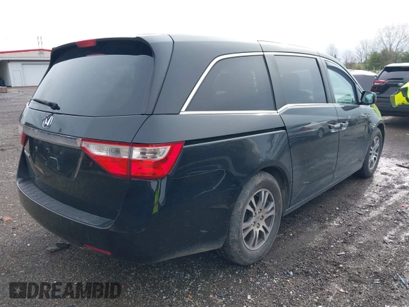 2012 Honda Odyssey EX with VIN 5FNRL5H46CB096547, listed as a IAAI auction lot 41919700 with 165,882 mi miles and . Bid and sale history available at carsss.com. Image 4.