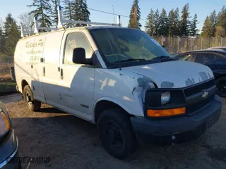 2006 Chevrolet Express Cargo Van with VIN 1GCGG25V061137999, listed as a IAAI auction lot 41451436 with 147,540 mi miles. Bid and sale history available at carsss.com. Image 1.