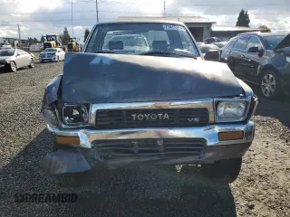 1989 Toyota Pickup DLX z VIN JT4VN13D0K0001910, wystawiony jako Copart lot #77413274 z przebiegiem 311 223 mil mil oraz Szkoda całkowita • Salvage title. Historia ofert i sprzedaży dostępna na DreamBid. Obrazek 5.