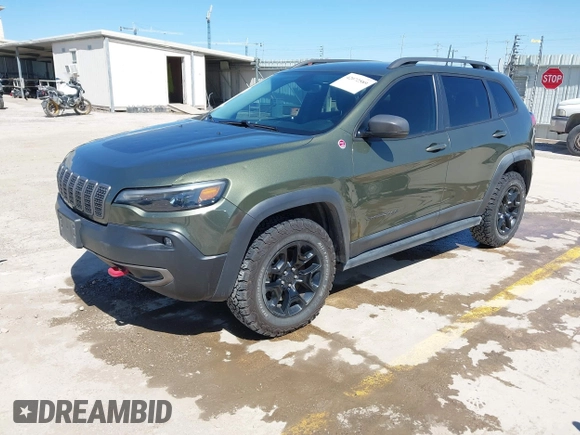 2019 Jeep Cherokee Trailhawk Elite with VIN 1C4PJMBN7KD287506, listed as a IAAI auction lot 42072589 with 108,034 mi miles and . Bid and sale history available at DreamBid. Image 2.