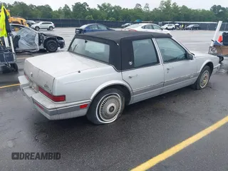 1991 Cadillac Seville z VIN 1G6KS53B2MU813855, wystawiony jako IAAI lot #42425470 z przebiegiem 168 194 mil mil oraz . Historia ofert i sprzedaży dostępna na DreamBid. Obrazek 4.